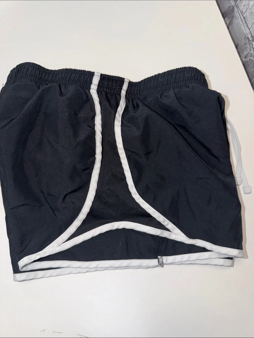 Girls Nike Black Shorts with White Trim and Swoosh